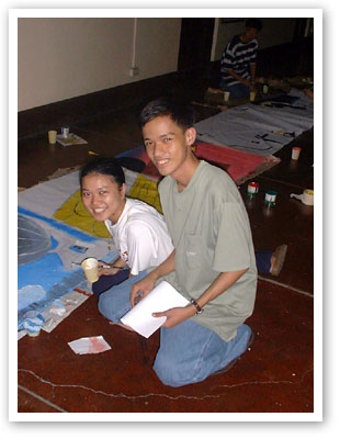  I and Chie busy working at the stage props for Technofair 2001.